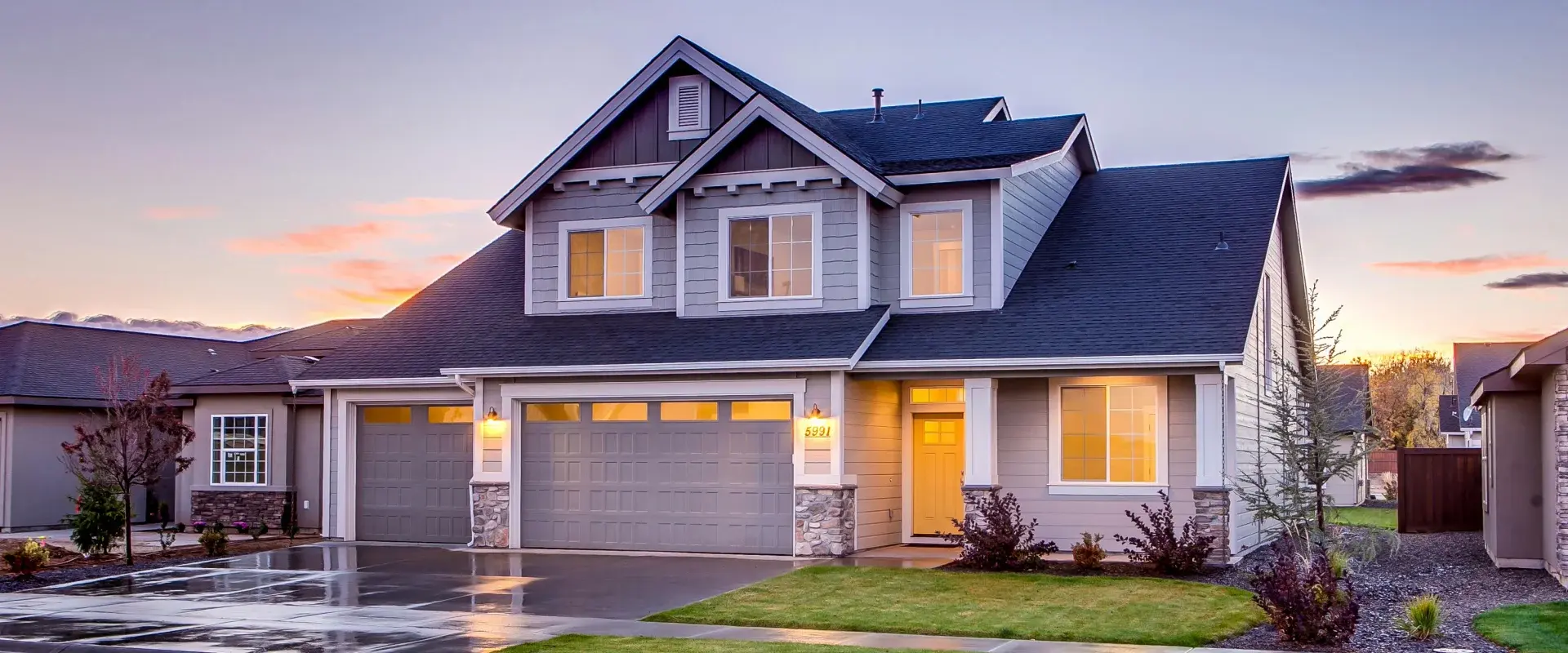 Luxury show home exterior at sunset - professional cleaning services Calgary Edmonton
